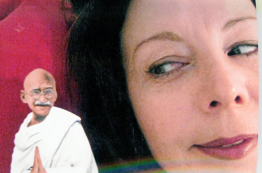 The Art Angel recovering at home in bed with Gandhi 